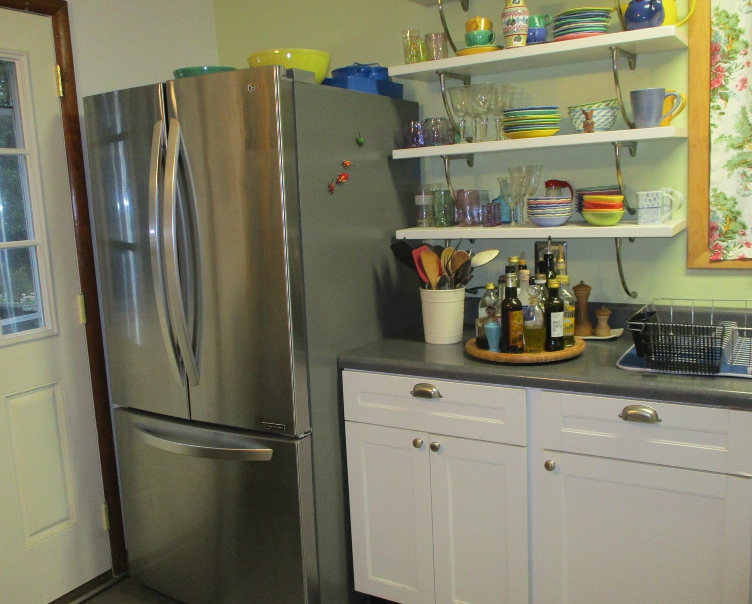 Kitchen with new fridge.